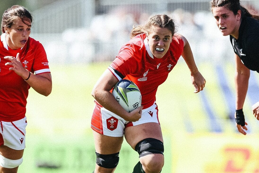 Natalia John carrying the ball for Wales Women in the 2021 Women's Rugby World Cup played in 2022.